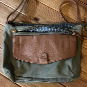 Cute canvas and leather purse with stripped fabric lining